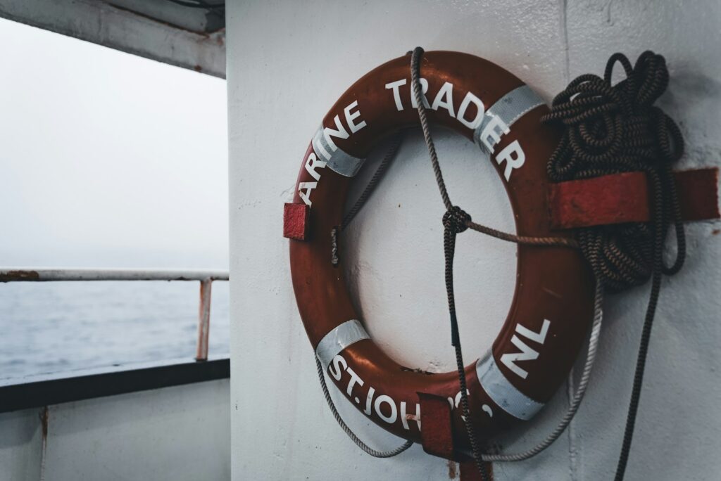 a life preserver hanging on the side of a boat