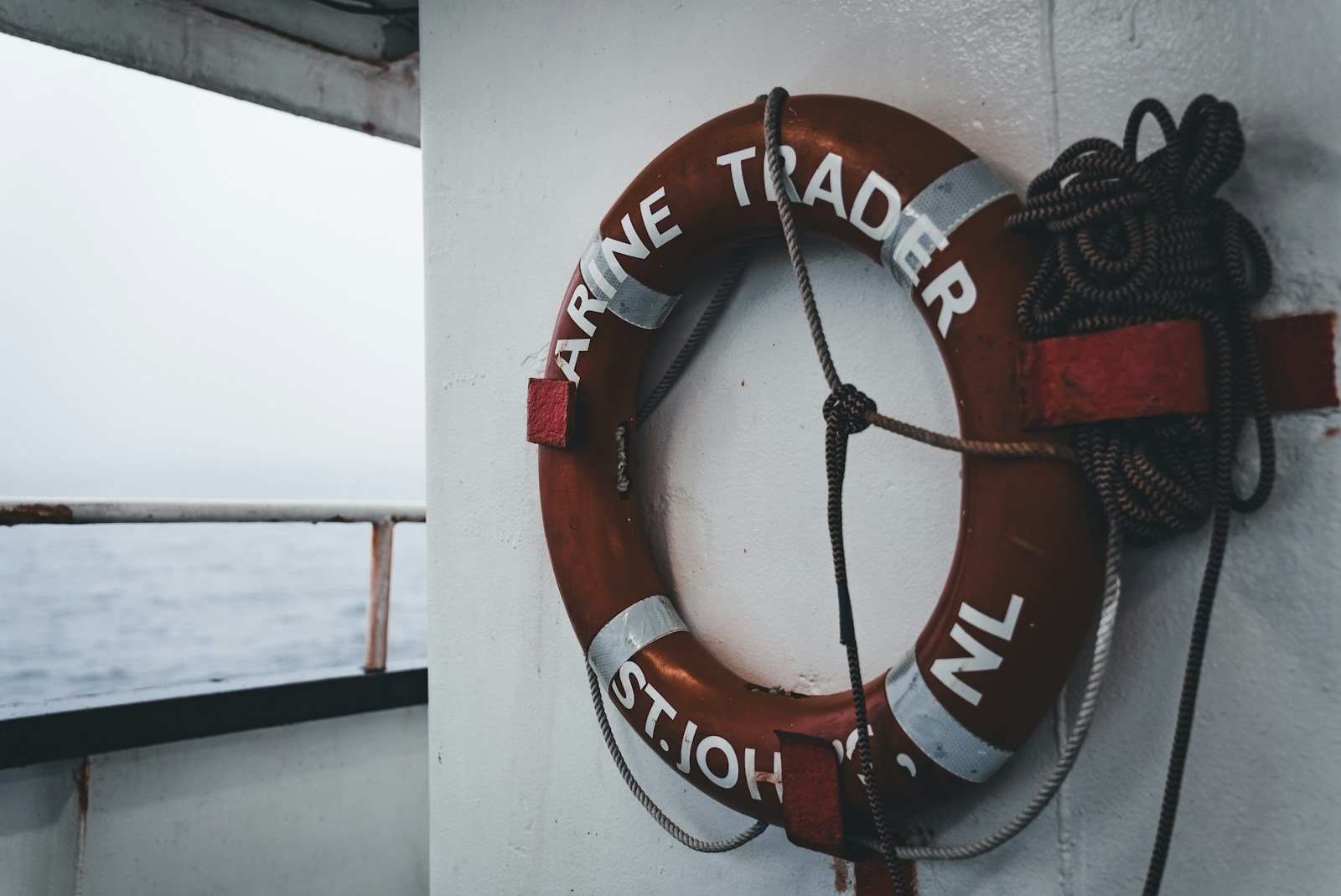 a life preserver hanging on the side of a boat
